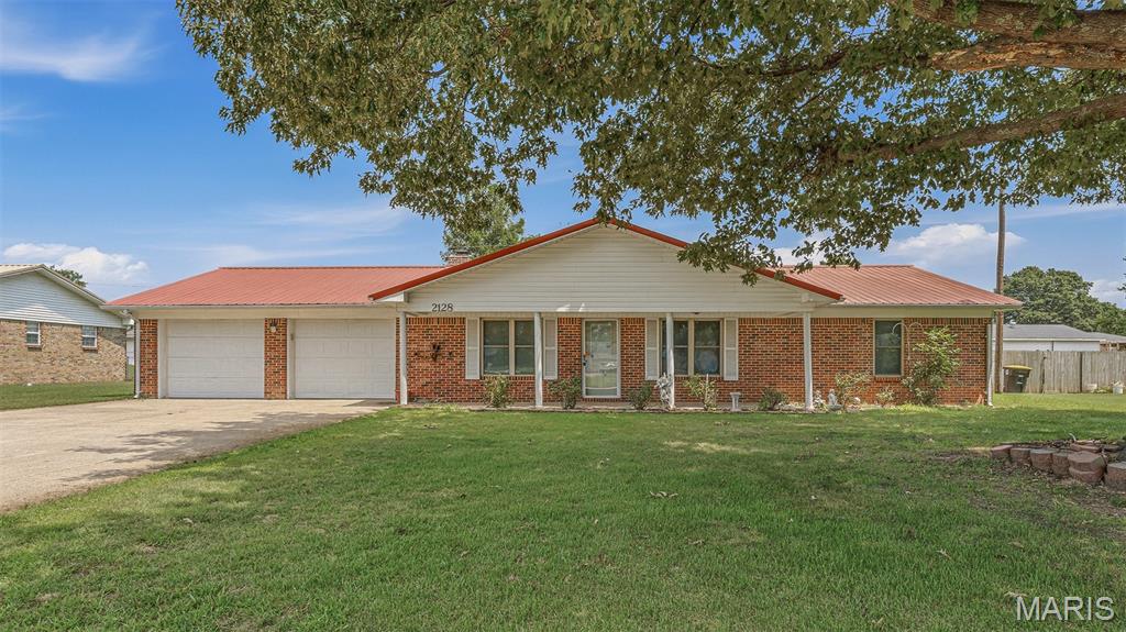 Check out this move in ready 3-bedroom 2-bathroom home located in a highly desirable subdivision in Kennett!
This well-maintained home features a large laundry room- with space to make a walk-in pantry, a wood burning fireplace, a large sunroom, storm shelter, large shop, 2 outbuildings & so much more! Call today & let me get you in this home before the end of Summer!