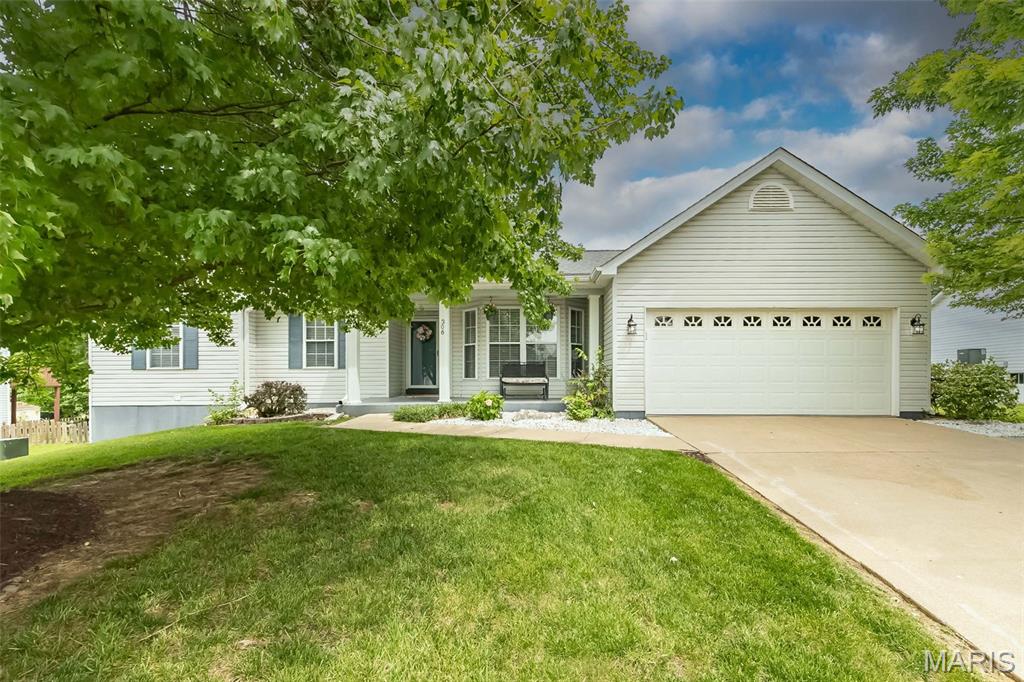 Welcome home to this beautifully updated ranch nestled on a quiet cul-de-sac just minutes from Downtown Wentzville and within walking distance to the elementary school! From the moment you step inside, you'll appreciate the abundance of natural light, soaring vaulted ceilings, luxury vinyl plank flooring throughout the main level, and stylish new lighting and ceiling fans throughout the home.
The spacious floor plan offers a separate dining room, convenient main floor laundry with built-in cabinetry, and a beautifully updated primary bath. The kitchen is equipped with all new stainless steel appliances and opens seamlessly to the main living areas, making entertaining a breeze.
The finished walkout lower level provides exceptional additional living space featuring a large bedroom, full bath, kitchenette, new carpeting, ample storage, and French doors leading to a covered patio—perfect for guests, multi-generational living, or a private retreat.
Outdoor living is just as impressive with composite decking overlooking the backyard, a storage shed for all your lawn and garden equipment, and plenty of space to relax and enjoy. Additional highlights include a finished 2-car garage, bay windows, vaulted ceilings, 2 storage rooms, and a newer HVAC system for added peace of mind.
This move-in ready home combines comfort, functionality, and an unbeatable Wentzville location—don't miss your opportunity to make it yours!