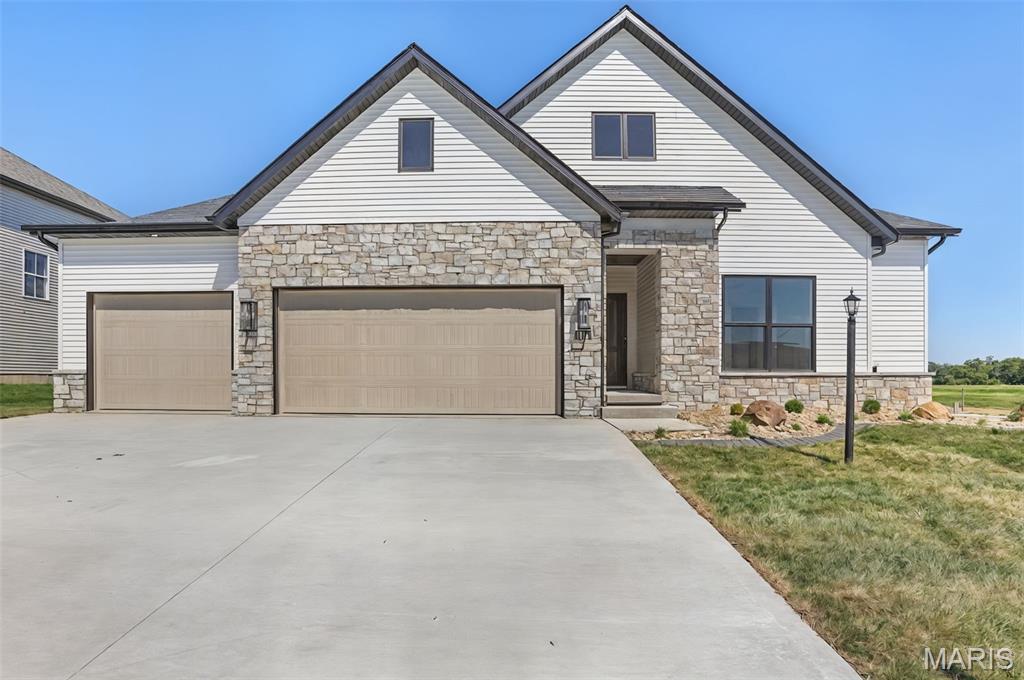 Find the layout and space you have been searching for in this 4 bedroom ranch in Savannah Crossing Subdivision. Built by Spencer Homes, you will appreciate the open concept floor plan with split bedroom design that is made for everyday living. The kitchen is the heart of the home with custom Amish cabinetry, ample workspace, gorgeous center island, and quartz countertops. The great room with gas fireplace will be the place to gather and entertain with high ceilings and natural light. The primary suite is spacious with spa like bath with dual vanity and walk in tiled shower. Large walk in primary closet will make organization easy. Two additional bedrooms and full bath on the main allow everyone the space they dream of.  Laundry room, drop zone, half bath, and a flex room that is great for storage round out the main level. Lower level is finished with 4th bedroom, 3rd full bath and large family room that will be amazing for entertaining, watching movies, or just relaxing. The large covered back patio is perfect for morning coffee and bar-b-ques. Close to schools, shopping, and trail access, schedule your showing today...