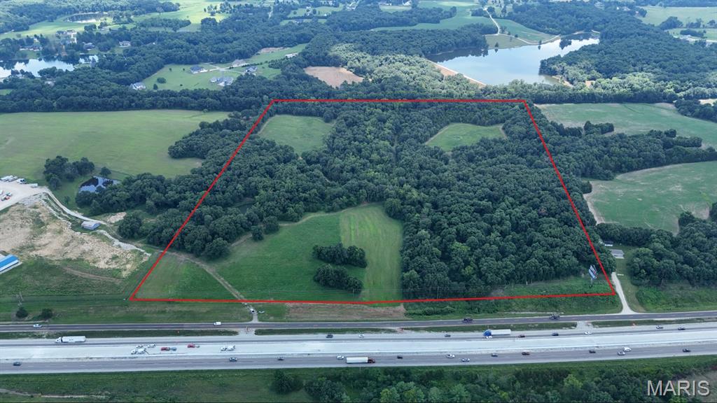 Premier I-70 Commercial Development Opportunity

Rare opportunity to acquire 50+ acres of commercially zoned land strategically located along the Interstate 70 corridor between Wright City and Warrenton. Boasting approximately 1,420 feet of I-70 frontage, this exceptional property offers outstanding visibility, easy accessibility, and incredible potential in one of the fastest-growing regions west of St. Louis.

Whether you’re an investor, developer, or business seeking a high-profile location, this property offers the size, zoning, and strategic location to bring your vision to life.