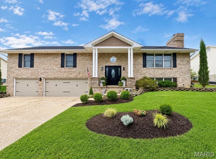 Beautifully updated 4 bedroom home with 3-car garage and modern features throughout. Enter the foyer with updated lighting to an open floor plan that flows into the large living room, with skylights and luxury vinyl plank flooring throughout. The dining room has a bay window for extra floor space, and updated lighting. The large kitchen has updated cabinetry, granite countertops, a breakfast room, a large pantry, ceramic flooring, and access to the manicured patio with a covered pergola. The primary bedroom has two oversized closets, one walk-in. The bedroom also has an updated luxury bath with double sinks, a freestanding tub, and a separate ceramic shower, and modern colors. Bedroom 2 and bedroom 3 have updated flooring and lighting. The bath on the main floor has a walk-in shower with a granite countertop. The main floor has an oversized linen closet, whole-house fan, barn-door accents, and more.  The lower level has an additional bedroom with a full bath, recreation room with a wood-burning fireplace, and large laundry. Newer a/c, Pella windows through-out, premium lighting, freshly painted in and out, new shutters and more.  Outside is a manicured lawn with beautiful landscaping and a private backyard with a white 6' privacy fence, pergola, paved sidewalk, and so much more. New roof in 2025. Don't miss this one.