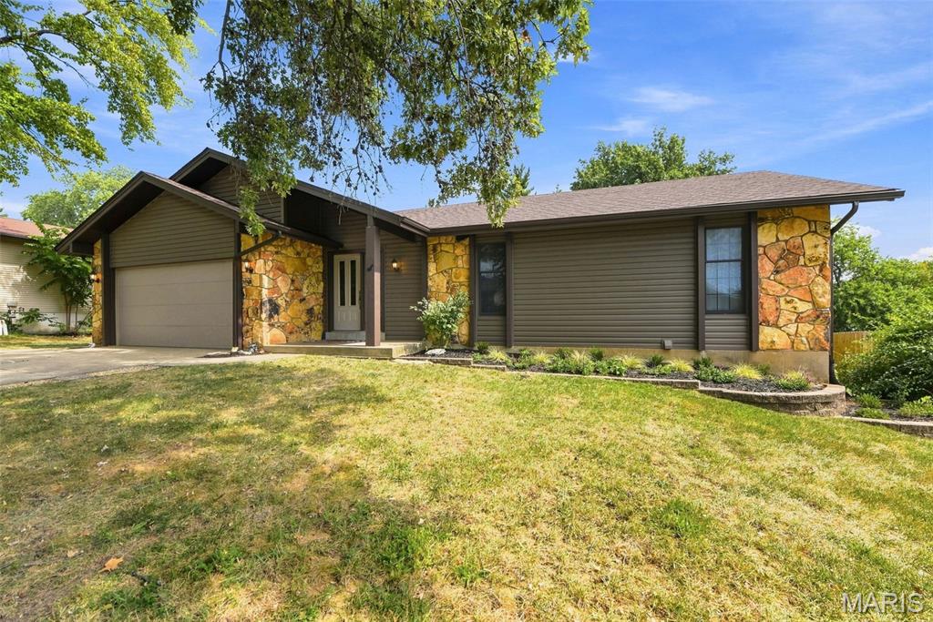 Wonderful 3-bedroom, 3-bathroom ranch located in the desirable Park Charles neighborhood! This home has been lovingly maintained and is ready for a new family to enjoy! The new owners will love the open floor plan with great room with wood burning fireplace, kitchen/dining room combination with access to the expansive multi-level deck that is perfect for entertaining. The primary bedroom has a large custom walk-in closet, updated primary bathroom with heated floors and private access to the deck/back yard. The main floor has two additional bedrooms and a second full bathroom. Wait, there is more! The partially finished lower level has a spacious family/recreation room, two additional sleeping spaces/offices, a third bathroom and a large laundry/storage area. This home has recent updates (2023) including the roof, gutters, siding, carpet and paint. The garage also has an epoxy floor for a great look and easy cleanups. This neighborhood has multiple lakes perfect for enjoying some fishing or quiet reflection. The location is close to major highways and amenities and within the highly rated Francis Howell school district. Don’t miss this one! Showings begin 9/10!