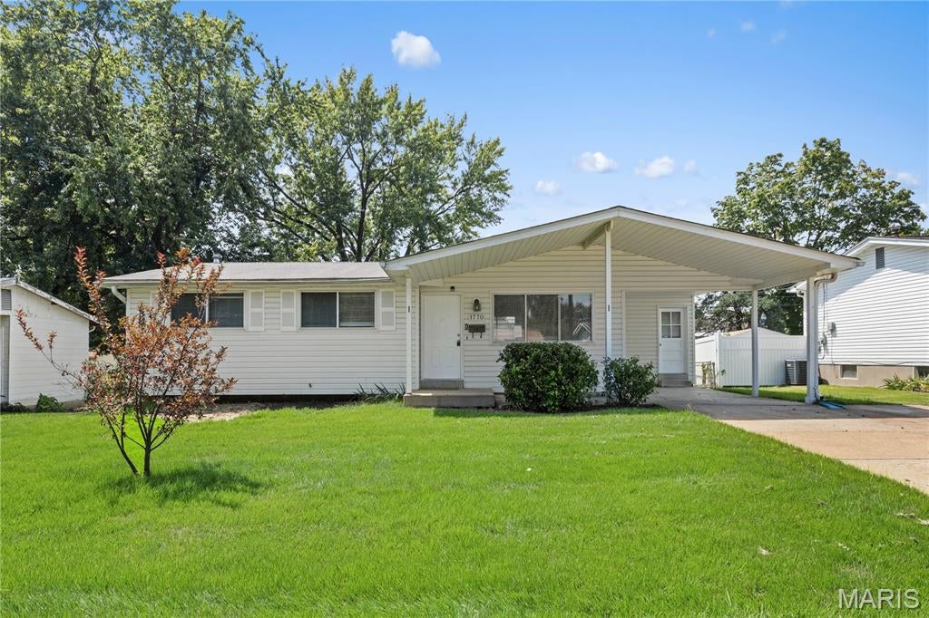 Welcome to 1770 Tahoe Dr! This charming 3-bedroom, 1-bath ranch offers comfortable one-level living in a convenient Florissant location. Featuring approximately 1,066 sq. ft. of living space, the home boasts new flooring, a functional and spacious floor plan, and plenty of natural light throughout.

The kitchen offers ample space for everyday living and includes a dishwasher and refrigerator. Additional highlights include a remodeled bathroom, main-level bedrooms, laundry hookups, forced-air heating, air conditioning, and covered carport parking.

Step outside to a great backyard with plenty of room for outdoor entertaining, gardening, pets, or simply relaxing.

Whether you're looking for a wonderful place to call home or a great addition to your investment portfolio, 1770 Tahoe Dr is ready for its next owner.

Schedule your showing today!