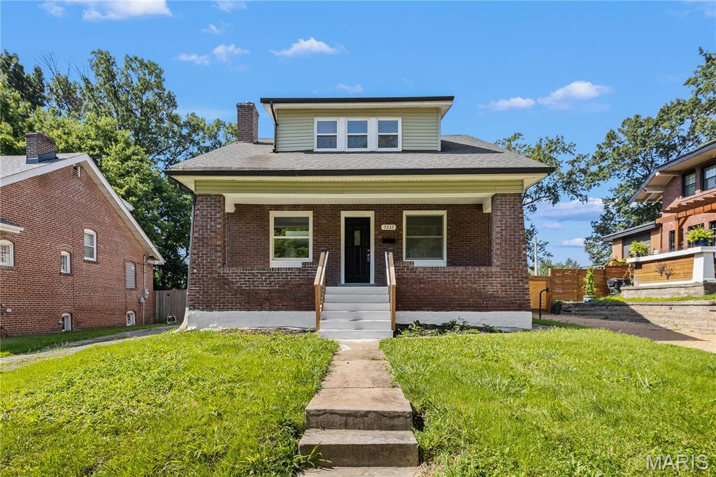 Welcome to 7332 Wellington, a beautifully renovated brick home that combines timeless charm with modern updates. Featuring 3 spacious bedrooms, 3 full bathrooms, and quality improvements throughout, this move-in-ready home offers comfort, style, and functionality in the heart of University City. Step inside to discover a bright, inviting interior with all-new flooring, fresh finishes, and an open, welcoming feel. Every detail has been thoughtfully updated, including new plumbing and electrical systems, giving you peace of mind for years to come. The all new kitchen is designed for both everyday living and entertaining, featuring modern cabinetry, attractive countertops, and plenty of workspace. Each of the three renovated bathrooms has been tastefully finished with contemporary fixtures and finishes. Enjoy the convenience of main-floor laundry, making daily chores simple and accessible. The cozy fireplace creates the perfect focal point for relaxing evenings with family and friends. Outside, you'll find a large, fully fenced backyard offering endless possibilities for outdoor entertaining, gardening, pets, or play. The classic brick exterior provides lasting curb appeal and low-maintenance durability. Located in desirable University City, this home offers convenient access to parks, shopping, dining, schools, major highways, and all that the St. Louis area has to offer.