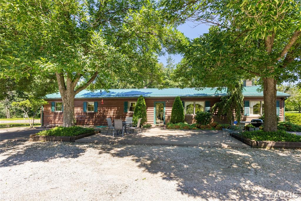 Discover an exceptional opportunity at 30677 252nd AVE, Durham MO 63438, a single-family residence built in 1986, offering a unique blend of established charm and modern potential. This property invites a closer look for those seeking a home with character and possibility. Enjoy your morning coffee looking out on your pond from your kitchen table.  Wildlife is in abundance here, right in your own yard with turkeys and deer along with birds of all kinds!  This is every hunter's paradise.  This home has only had one owner who has very meticulously kept the property.  You will be hard pressed to find any major repairs needed.  All you have to do is move in! This could be your forever full time residence or a great getaway on the weekends!  This property sits on 22.5 beautiful acres.  While being located in the middle of nature, you're still only 20 minutes' drive from Quincy and 30 minutes from Hannibal for the perfect location!  The possibilities are endless!  Inquire today to schedule your personal tour of this distinctive Durham residence.