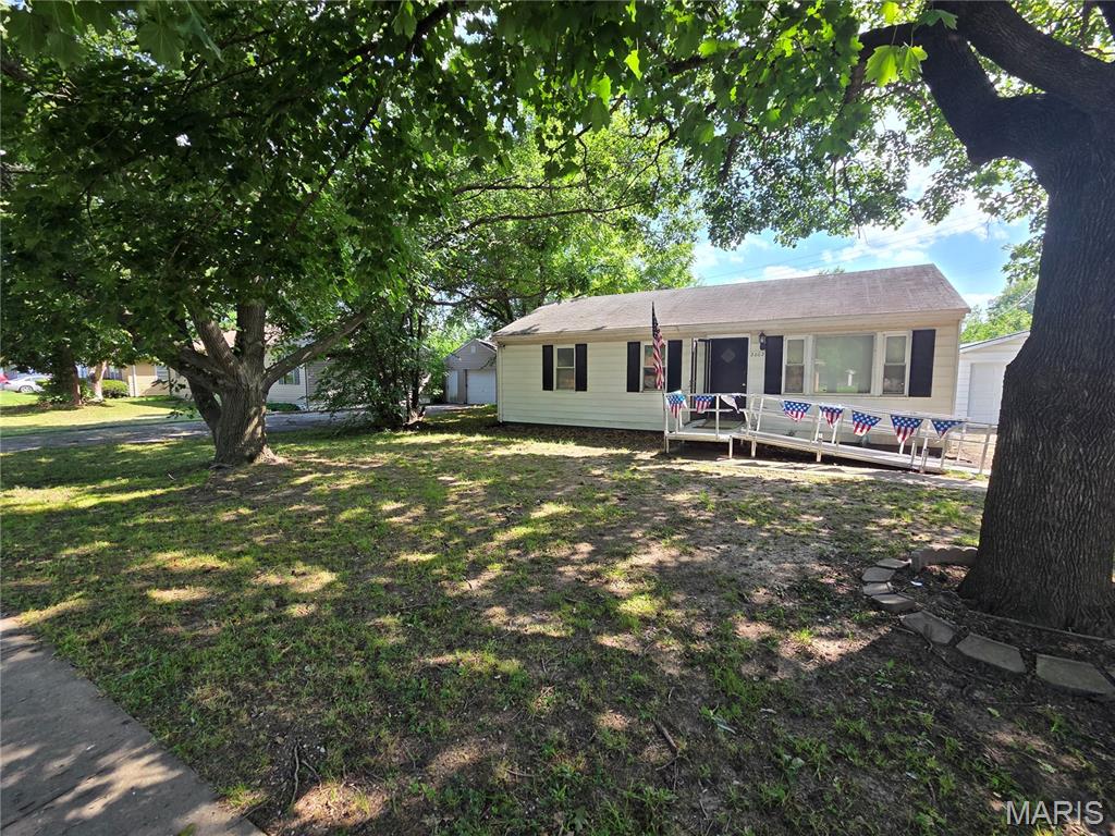 What a wonderful little neighborhood-very close to highways and grizzly stadium. Oversized lot for room to expand a larger garage, add a shed, or pave for additional driveway. Fenced-in backyard with trees for privacy and an above ground pool. Updated home with newer flooring, electrical, and paint throughout. All appliances included in addition to washer and dryer to remain. Will remove pool upon request. New metal roof on garage. Lots of parking. Pass through opens up the kitchen and living room with wood framing and granite countertop. Bathroom has ceramic surround, flooring with granite vanity. Up to code and move-in ready seller prefers to sell "as is".