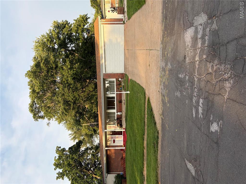 Spacious 3 Bedroom 2 and 1/2 Bath Ranch Home, 2 Car Garage Sitting on Large corner lot, with a Season Room addition. A must see!