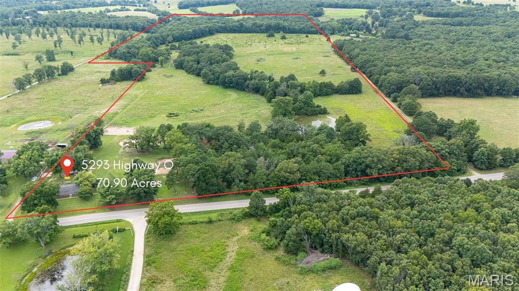 Escape to the peace and beauty of the countryside with this beautifully renovated 3-bedroom, 1-bath home situated on 70.90 acres m/l conveniently located between Rolla, Salem, and Licking! Renovated in 2022–2023, this approximately 1,612 sq. ft. home blends modern updates with timeless farmhouse charm. The open-concept layout is enhanced by shiplap accents throughout, creating a warm and inviting atmosphere. The spacious kitchen is a true standout, featuring butcher block countertops, a pantry, double ovens, stainless steel refrigerator, custom cabinetry, and charming antique sink and stove that add unique character. The updated bathroom offers dual vanities and a tub/shower combination, while major improvements including new windows, doors, HVAC, and most appliances provide peace of mind.  Step outside to discover a property that's ready for your farming or homesteading dreams. Approximately 60% of the acreage is open pasture, complete with a barbed wire perimeter fence, 3–4 strand electric cross fencing. Chicken coop, garden beds, a goat enclosure, a permanent corral system, and a run-in shed all convey with the property!  Portable corral panels & pens are not included. A valuable bonus awaits at the back of the property with a ready-to-build site featuring a 30x40 concrete footing, new well and pump, and full electric service already established. This added infrastructure, valued at approximately $35,000, provides a great head start for your future build or additional improvements. Whether you're looking for a hobby farm, livestock operation, or simply a private country retreat, this exceptional property offers endless possibilities. Spectacular views, breathtaking sunsets, abundant wildlife, modern comforts, and usable acreage make this one a must-see—schedule your private tour today!
