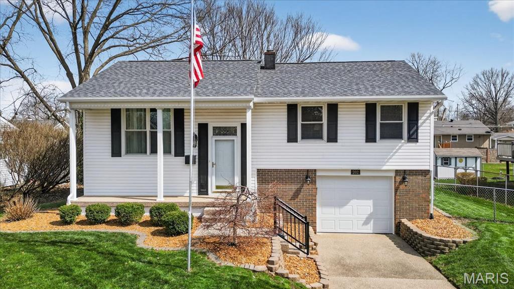 Welcome to 202 Whitehall Dr in O’Fallon, IL — a well-cared-for and spacious home offering versatile living areas, great outdoor space, and exceptional functionality.

The main level features a bright living room with hardwood flooring, flowing into the dining area and a generously sized kitchen with ample cabinetry, counter space, and a breakfast bar. Step out onto the large elevated deck, ideal for outdoor dining or relaxing while overlooking the expansive backyard.

The finished lower level provides additional living space with a cozy family room, extra bedroom, and full bath—perfect for guests, a home office, or extended living. You’ll also find a clean utility area with laundry, storage, and well-maintained mechanicals.

Outdoor highlights include a spacious patio, a large, level backyard, and a charming storage shed for added convenience. The yard offers plenty of room for gardening, play, or entertaining.

Additional features include an attached garage, mature landscaping, and great curb appeal. Conveniently located near shopping, dining, schools, and major highways, this home offers comfort, space, and a desirable location.

Don’t miss your opportunity to own this move-in ready home!