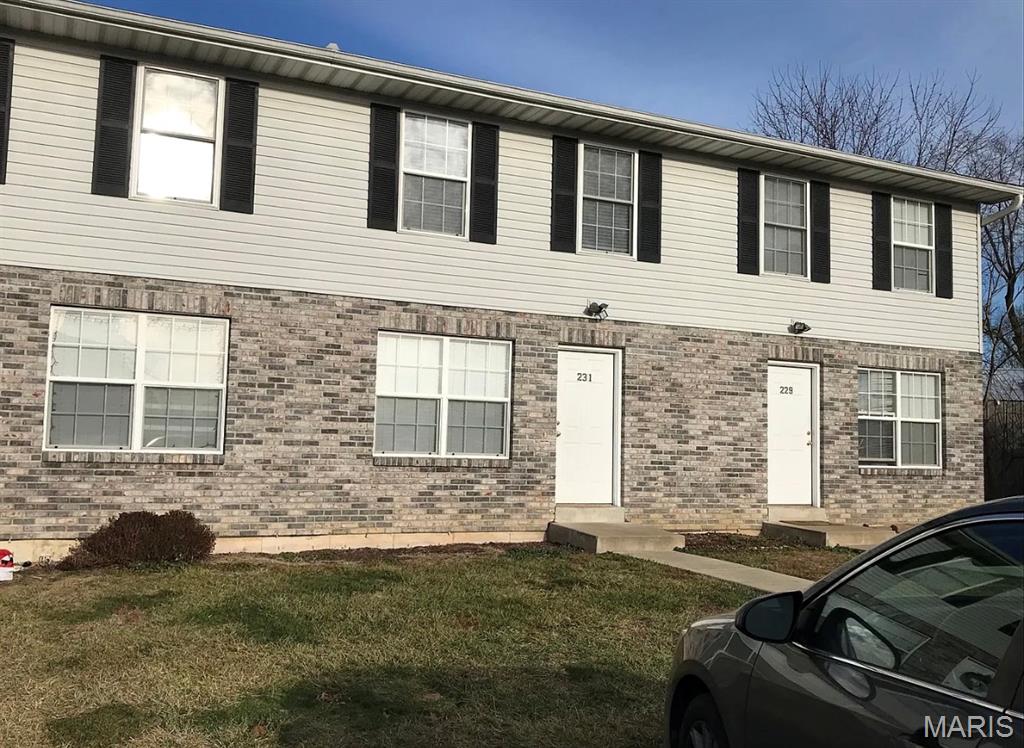 This 3-bedroom, 1.5-bath townhome at 231 Truman Ct offers plenty of living space at an affordable price. The main level includes a comfortable living area, kitchen with stainless steel appliances, and convenient half bath. Upstairs, you'll find three bedrooms and a full bathroom. Unit includes off-street parking and in-unit laundry hookups. Lawn care and trash is included in rent. Tenant pays electric and water/sewer. Located in a quiet Moscow Mills neighborhood with easy access to Hwy 61, schools, and shopping. NO SMOKING. NO PETS. One month security deposit required.