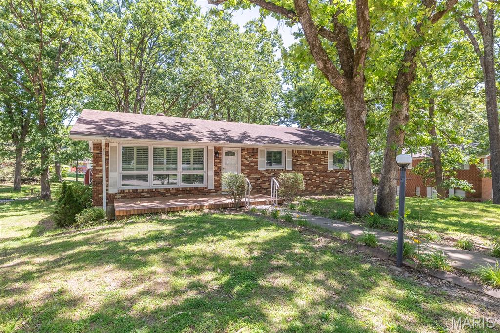 Tastefully remodeled 4 bed 3 bath home perfectly located in Poplar Bluff!   Roughly 3,000 square feet of living space and a large screened-in porch offers plenty of room for your large or growing family!  Call TODAY!