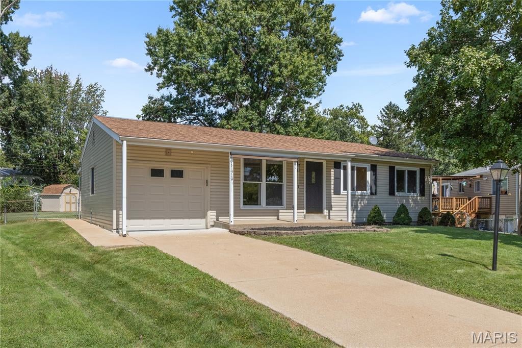 Wow! Welcome to 11919 Holly Brook in beautiful Maryland Heights! You'll want to see this one because the moment you pull up, you'll notice the large corner lot and all the space that comes with it.

It feels like home the moment you walk in, with a great floor plan, refinished hardwood floors, and a completely updated kitchen featuring new flooring, cabinets, granite countertops, and stainless steel appliances. Head down the hall and you'll find a brand-new full bathroom that's been tastefully updated, along with the primary bedroom and bathroom plus two additional bedrooms.

Don't worry, there's more! Downstairs is the perfect place to entertain, relax around the fireplace, or create the extra living space you've been looking for, complete with new carpeting throughout.

The entire home has been touched in one way or another to welcome its new owners. And remember—that large corner lot means your entertaining options don't stop inside. Step out onto the backyard patio and enjoy plenty of green space that's perfect for get-togethers, gardening, or your favorite four-legged friend.

The sheds are included too, giving you extra storage so you can actually use your garage like it's supposed to be used!

There's a lot to love about this home. Don't wait on this one—schedule your showing today!