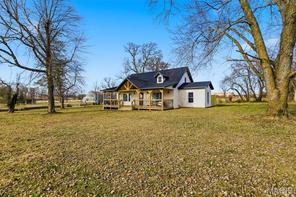 Country home for sale on the edge of town! This home with charm has so much to offer. The large lot with .86 acres of land provides enough space for a garden to plant, kids to run and outdoors to enjoy from your large covered front porch with beam accents. The home was built in 1940 and offers so much character you don't find in newer homes today. There are 4 bedrooms (one non conforming), living area, large formal dining room and many updates throughout including heat and air 2 yrs old, roof is 2 yrs newer flooring and stainless steel appliances included. The 4th non-conforming bedroom could also be used as a family room, play room, office, workout area, homes school, craft room or anything you can imagine! Close to area amenities with LOW TAXES. Call today to view this amazing home!