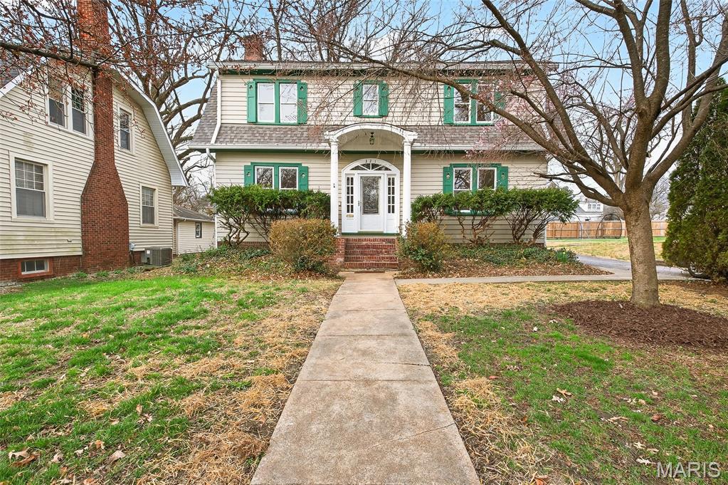 BACK ON THE MARKET!!   ( Home has passed Belleville occupancy). This updated and beautiful colonial home is just waiting for it new owners. The moment you walk in to the open foyer and see the stunning wood stairs you will feel at home.  The dining room is off to the right and to the left is a large living room with a wood burning fireplace and built in bookcases. This room is just waiting for entertaining.  The 1/2 bath is between the living room and kitchen. The kitchen has been all updated with new stainless steel appliances and new flooring.  There is a pantry and a door to the family room that boast tons of natural light with all the windows.  If you take those beautiful stairs up you will be welcomed by a cozy 7.5 x 7.5 area to hang out, put a couple chairs there and relax.  The upstairs foyer also has 4 closets.  The master bedroom is large with 2 closets and tons of room for plenty of furniture.   On the other side of foyer the other 2 bedrooms and a full bath.  The  2nd floor cozy area and the bedrooms have all new carpet.  There are tons of other great features such as new windows, crown molding, 9ft ceilings on main level, fenced yard, parking pad off alley, patio and shed.   Come and see how happy you could be in this home.  Professional exterior and interior pictures to be entered Saturday.