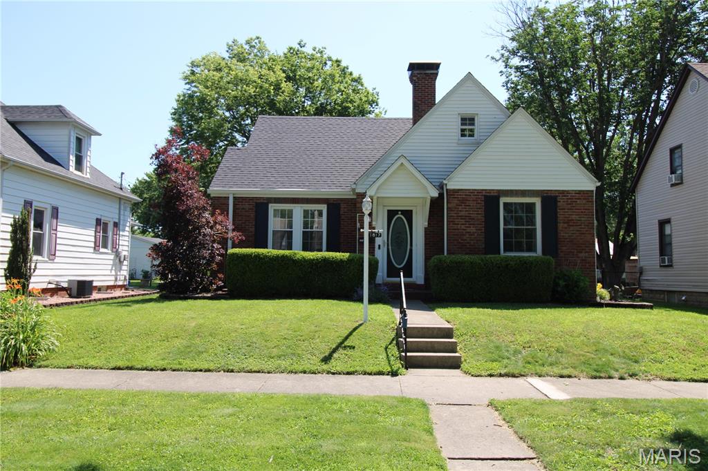 CHARMING 4 Bedroom/2 Bath Home With HUGE 32 x 22 DETACHED GARAGE & RV PARKING POSSIBLE; FEATURING: OPEN FLOOR PLAN; Kitchen With Breakfast Island, Dishwasher, & Microwave; Living Room With Gas Fireplace & Lots Of Original Wood Flooring Throughout.