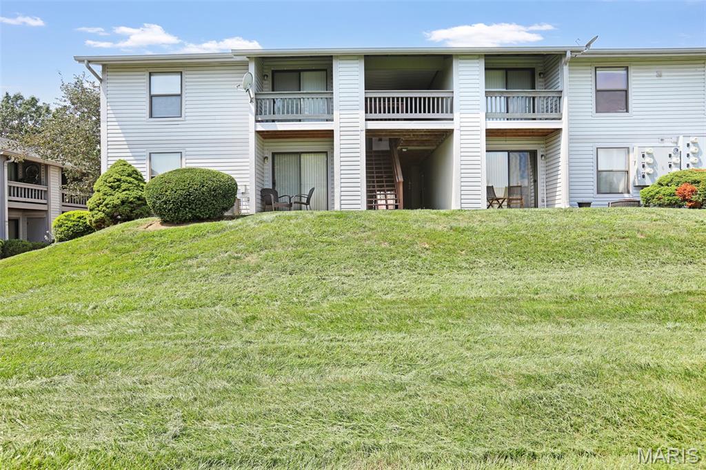 Welcome to this inviting 2-bedroom, 1-bath condo in the desirable Francis Howell School District in St. Charles. The light-filled interior features vaulted ceilings, hardwood floors, newer windows, and abundant natural light throughout.  The eat-in kitchen offers plentiful cabinet space and newer appliances, making it both functional and welcoming for everyday living. Two generously sized bedrooms provide ample closet space, while the private deck creates a great place to relax or entertain outdoors.  Additional highlights include newer HVAC, a private storage unit, and one covered parking space. Residents will also enjoy access to the community pool. This well-maintained condo combines comfort, convenience, and an excellent location—ready for its next owner to call home.  Complex is FHA approved and allows rentals.