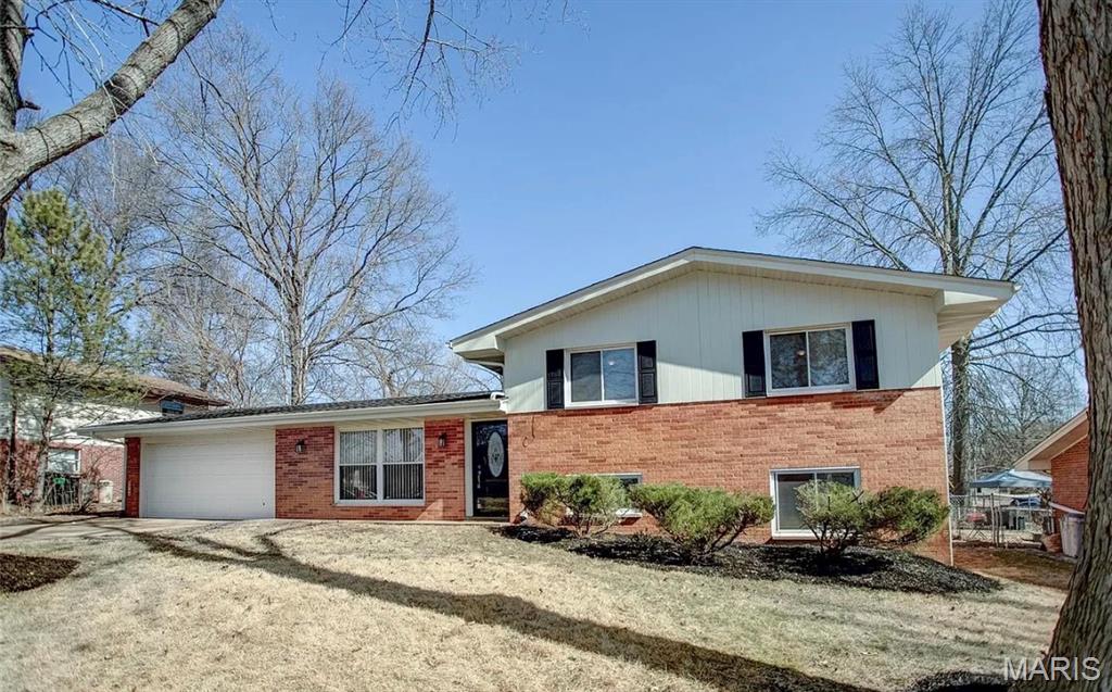 Welcome home to this charming brick tri-level with a walk-out basement, offering plenty of space for comfortable living and entertaining. This move-in-ready home features 4 bedrooms, 2 full bathrooms, and an attached 2-car garage.
The main level boasts a spacious living room, dining area, and an updated kitchen complete with stainless steel appliances, quartz countertops, and a stylish ceramic tile backsplash. The versatile lower level provides additional living space that can easily serve as a family room, recreation room, playroom, home office, or guest suite, along with a full bathroom and additional bedroom. Roof installed in 2024, providing added peace of mind. Step outside onto a covered patio, enjoy the expansive fenced backyard, perfect for gatherings, pets, or outdoor activities, and take advantage of the convenient storage shed for your lawn and garden equipment.
Don’t miss the opportunity to make this well-maintained home yours. Schedule your private showing today!