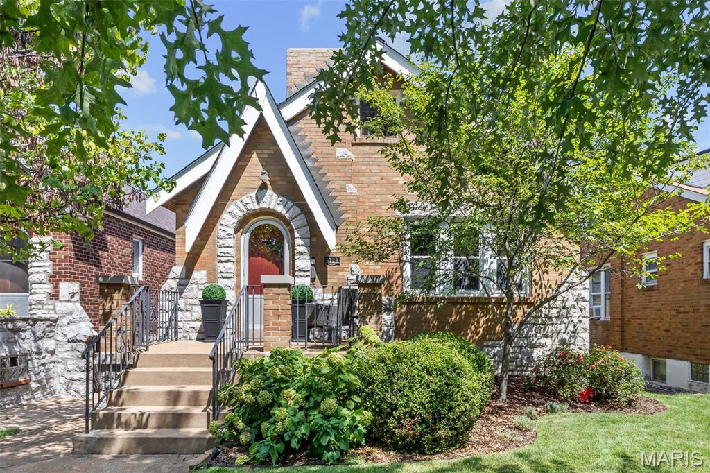 Discover a Unique Lifestyle opportunity at 5729 Goethe AVE, STLS MO 63109. This single-family residence, built in 1936, presents an Gorgeous property in Great condition, offering a blend of classic charm and modern comfort. Wood Burning Masonry Fireplace, Hardwood Flooring, Ceramic Flooring, Updated Windows and Bath, NEW Roof, Some New Siding! Enclosed Sun Room with New Luxury Vinyl Flooring and Fresh Paint! Lovely Back Yard with Sidewalk winding through Patio, Landscape & Turf Areas, and Raised Garden Beds.  The exterior of this residence showcases a distinctive Gingerbread Architectural style, creating a captivating first impression. Lovely Front Porch with Room to sit and Enjoy the Beautiful Landscape! This Community is Unique with Friendly Neighbors and Tree Canopied Streets and Sidewalks! Loads of Fun Restaurants and Shopping all within Walking or Biking distance!  The property features Two Comfortable Bedrooms, providing ample private space. A single well-appointed bathroom serves the home. Beyond the interiors, a private fenced yard offers a secluded outdoor retreat, complemented by a charming patio perfect for relaxation or entertaining. Large Garage with extra room for storage!  Walk out Lower Level offers plenty of room for growth and includes laundry and storage areas! The Fenced Backyard is AMAZING!  Winding Sidewalk, Lighting, Raised Garden Beds and Professionaly Landscaped Beds and Beautiful Turf!  Enjoy Barbecueing with Family and Friends on Back Patio!  Your Children and Pets can safely play in the Fenced Yard, with Access to Garage for additional Storage and Parking our Vehicle! This property invites you to experience a Distinguished Living Environment.