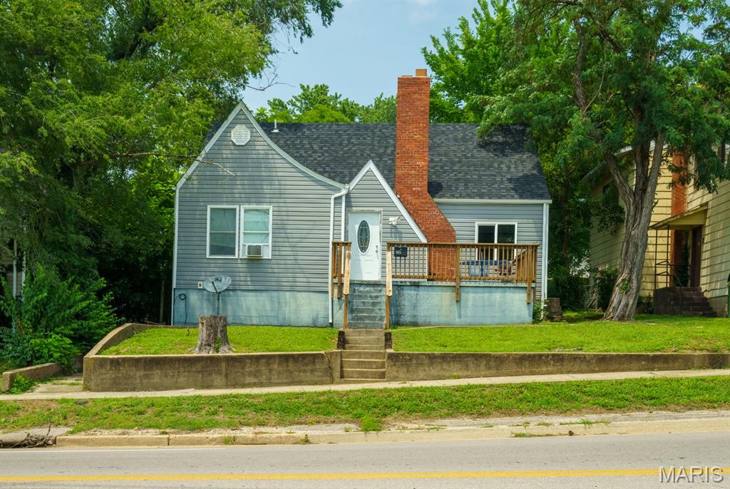 This is a BIG house with 4 bedrooms, 4 full baths, mostly finished walk out basement and 3-car garage!  Big laundry room, wood floors, fireplace in the living room, galley kitchen.  Master bedroom is on the main floor and has a walk-in closet plus a full bath with double sinks, separate shower and whirlpool tub.  2 bedrooms are on the main floor, 1 upstairs and 1 in the lower level.  2 baths on the main floor, one upstairs and one in the lower level.  This home has a lot of space, living room, family room on the main floor plus a rec room, bonus room/storage in the lower level and the upstairs is a big bedroom/bathroom suite!  So much potential here!  Home with room for everyone or rental.