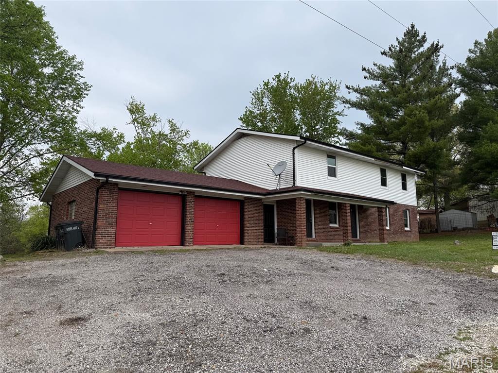 Very hard to find in Warren county- income producing property. This is a 5 bedroom home that was converted to a duplex style 2 unit property on .75 acres in the beautiful Marthasville area.  Lower 2/1 unit and garage is occupied through March 2027, the upstairs 3/1 unit is vacant currently.  This has been updated and is a beautiful space for investing and living. On a private well and septic. Call your agent and get an appointment set up!