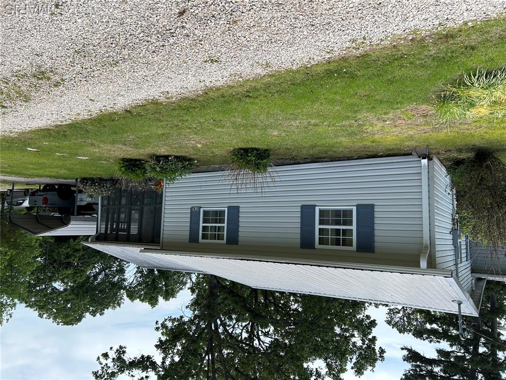 Welcome home to this spacious 2-bedroom, 2-bath home situated on two lots totaling approximately .48 acres in the Ellington area, just 1.5 miles from Clearwater Lake. Offering plenty of room to spread out both inside and out, this property is ideal as a full-time residence, weekend getaway, or lake-area retreat.

Inside, the kitchen serves as the heart of the home, featuring a pantry, gas stove, and ample space for gathering. Newer flooring throughout the main living areas adds a fresh, updated feel. The spacious primary suite includes beautiful wood flooring, a private full bath, and an oversized walk-in closet. A sunroom provides additional living space, while the office/den and an extra sleeping area offer flexibility for guests, hobbies, or working from home. Main floor laundry adds everyday convenience.

The unfinished walkout basement offers abundant storage, workshop space, and future potential. Outside, enjoy the recently painted deck, a storage shed, and the added benefit of two detached carports—one for vehicle parking and a separate covered carport designed for a pontoon boat or additional recreational storage.

With two lots, plenty of parking and storage, flexible living spaces, and a location just minutes from Clearwater Lake, this property offers a great opportunity to enjoy lake-area living with room to make it your own.