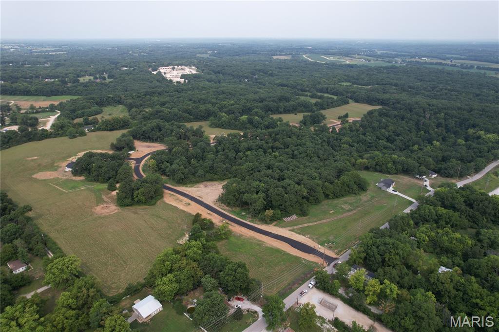 Build your dream home on this beautiful 3-acre level lot in a brand-new subdivision in unincorporated Lincoln County. This setting offers the space, privacy, and country feel buyers are looking for, while still keeping you close to town, daily conveniences, and major routes. The level, usable layout gives you room to design the home, outdoor living areas, garden, workshop, or extra space you have been wanting. Horses are allowed, giving buyers even more flexibility to enjoy the land and create the lifestyle they have been looking for. Paved private streets give the neighborhood a clean, finished feel, and public water is available for added convenience as you plan your build. With limited restrictions, you have room to make the property your own while still enjoying the benefit of a thoughtfully planned neighborhood. Surrounded by open ground, mature trees, and scenic views, this subdivision offers a peaceful backdrop without feeling remote. There are 14 additional lots available, with pricing starting under $120K, giving buyers options for size, setting, and location within the neighborhood. Come explore the possibilities and picture your next chapter here!