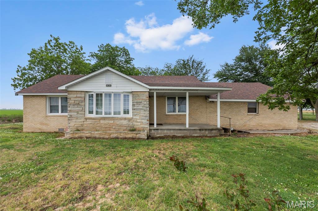 Well maintained country home with acreage! These opportunities don't come up often in this area!! 3-bedroom 1 bath home located on 2 acres of land & surrounded by farmland! 
This well-maintained home has a lifetime of memories throughout the years with the original owners. It is the perfect place to start a new generation of memories and make your country living dreams a reality! The attic area has been converted into livable/ usable space! This bonus area would be great for a hobby room, storage, or a playroom. The pecan trees are a great way to generate extra revenue. The shop/barn has a new roof and has been very well maintained. Also includes a new Generac generator! call today to take a look!