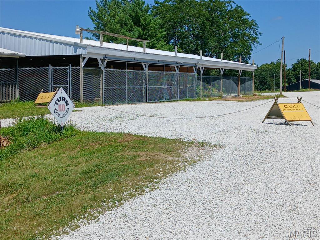 LOCATION = LOCATION = LOCATION!!!!
548 feet of frontage on I-44! If visibility is what you need to sell your stuff, this is a proven LOCATION with 35,000 cars and trucks passing within 200 feet of your front door every day.

The original building, built in the early 1940s on historic Route 66, began as Delano Thrifty Service—selling gas and snacks, with a small one-bedroom apartment in the back. The lower level includes a 2-bedroom apartment for additional rental income.

The second building, constructed in 1950, was once Thrifty Inn Roadside Diner (approx. 800 sq ft). It also includes a 2-bedroom apartment downstairs, offering even more income potential.

The current owner operated Route 66 Motors & Nostalgia Gift Shop here for 35 successful years—selling classic and late-model vehicles, memorabilia, and petroliana to both Route 66 and I-44 travelers—until health and age shifted priorities. These iconic 1940s–1950s buildings are ready for your vision.

Westbound I-44 travelers have easy access just 1 mile away at Exit 189—home to Love's and the new QuikTrip Travel Stop.

This 1.29-acre property recalls a time when life moved slower and drips with nostalgia. It features a deep well, two commercial septic tanks, and three steel beams set in concrete from a previous double-sided billboard—ready for your custom signage. The billboard can be seen by 35,000+ vehicles daily from both directions on I-44, ¾ mile out.
