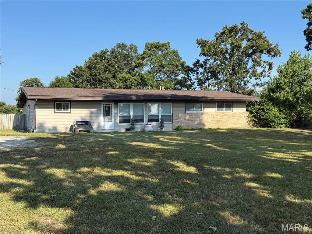 Charming Country Home Close to Post!
Welcome to your perfect slice of the country—this 4-bedroom, 2-bath home sits on a peaceful 1-acre lot with a fully fenced yard, ideal for pets, kids, or just enjoying the wide-open space. Step out back and relax or entertain on the huge deck, perfect for summer evenings under the stars.

Inside, you’ll find a bright, well-maintained home with a chef’s dream kitchen—tons of counter space, plenty of cabinets, and a layout that’s both functional and inviting. Major updates are already taken care of with a roof less than 5 years old and heating and air under 2 years old, giving you peace of mind for years to come.

Whether you're looking for room to grow, space to garden, or just a quiet place to unwind, this country charmer checks all the boxes—and it’s just a short drive to Fort Leonard Wood