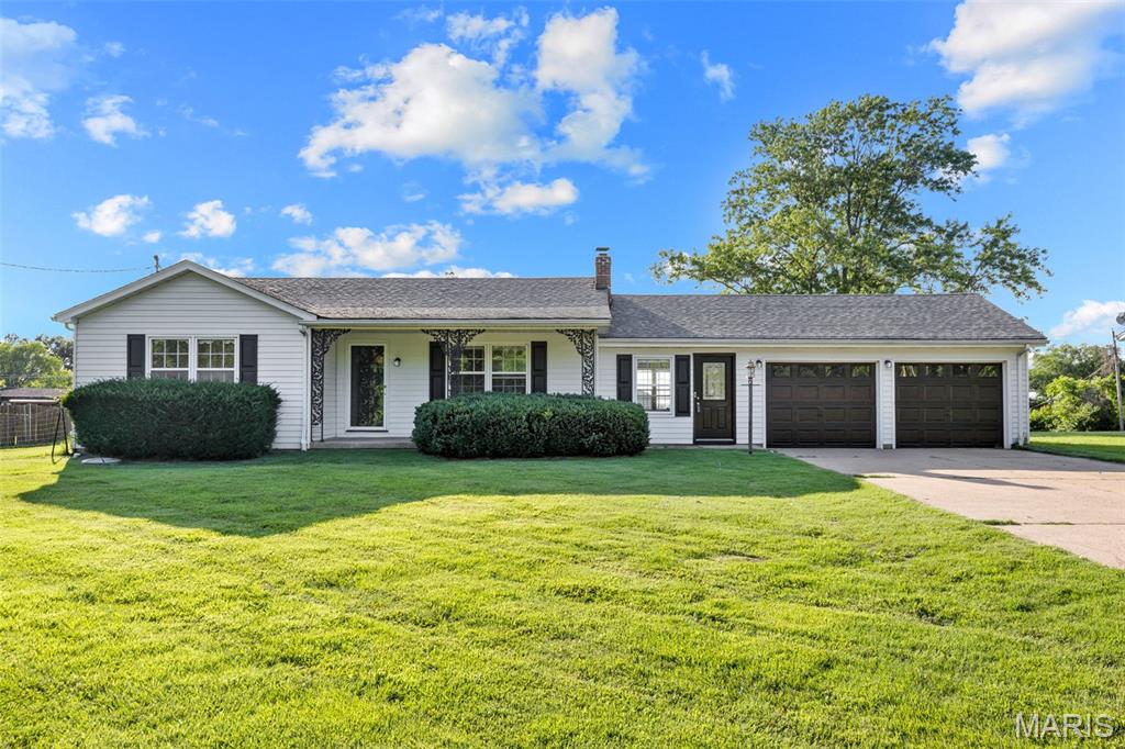 Beautiful ranch on estate like lot offers plenty of room for future expansion and with its close proximity to Cottleville makes this one a win! Come see this fantastic 2 bed/2 bath/2 car garage ranch featuring 3/4 inch hardwood floors, freshly painted throughout, and a HUGE lot. Home has large family room open to the kitchen with plenty of room for entertaining including an island! There is a bonus room off the kitchen between the garage and home that could be converted to a 3rd bedroom, home office, formal dining room, let your imagination run wild! Bedrooms wont disappoint, both are plenty large with a walk in closet in the master! The unfinished basement has plenty of room for extra storage with a walk out door to the backyard. The fenced backyard is plenty big for the family BBQ, the family pets, kids play area or even to add a pool!! This price point is hard to find in St Charles County, come get it before someone else does!