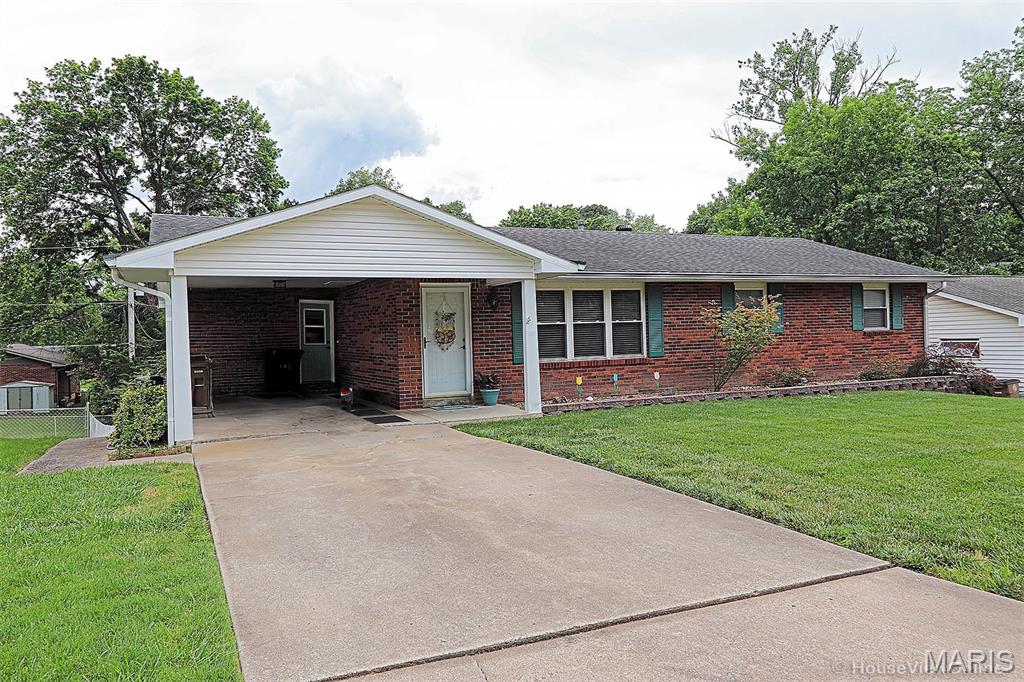 Beautiful brick ranch home with walk out basement and attached carport. Updated kitchen and both main level bathrooms. Extra large kitchen that also has an island and under the counter lighting. Partially finished bsmt to expand your living area. Bsmt walks out to a beautiful back yard for your family fun.