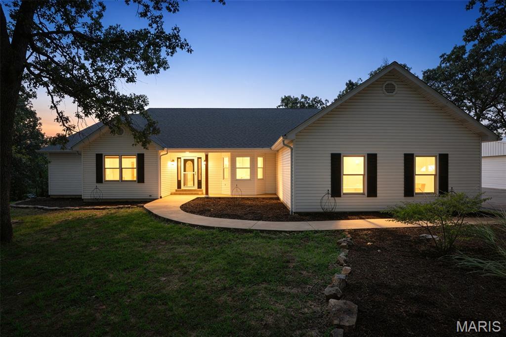 Hobby farmers!!! Hunters!!!! Those wanting luxury in a private setting!!!!! Here is your home! With nearly 4,700 sq feet of finished living space; 6 bedrooms, 3.5 bathrooms, desirable location in Jefferson R-VII School district,  17.64 +/- acres, MASSIVE shop, additional outbuildings, minimal restrictions and Updates throughout- this home will leave you speechless! The circle drive spans the sprawling, shaded front yard providing access to the oversized 3 car garage, expanded parking area with room for an RV and the detached xxxxx shop. The covered front porch leads to the formal entryway, formal dining room and directly into the living room which is showcased by natural light cascading from the skylights (remote controlled shades) and updated flooring. The ultimate kitchen provides seemingly endless counterspace, abundance of cabinetry, center island and a U-Shaped bar top for additional seating. Double oven and functional layout for those who are chef's at heart. Dual pantries! Eat-In dining room opens to one of the 2 decks- replaced 2026. Main floor master on suite-redone 2026 with walk in shower,  separate free standing tub in bay window. Dual sinks and customy vanity with added center storage. 2 walk-in closets and access to private, covered deck. There are 2 additional main floor bedrooms with Jack and Jill full bath. Hallway half bath and expansive Laundry room with slop sink complete the main level. The basement is mostly finished with 3 more bedrooms, a full bathroom, secondary laundry room,  7th sleeping area or office and unfinished are to complete as more living space or use as storage. Basement walks out to the lower level, covered patio and backyard access- where most of the property lies. Chicken coops on site so bring your birds! There isn't much you can't do here, however HOA says NO PIGS! Home has 440 amp service and propane reserve for the generators. NEW ROOF 2026.