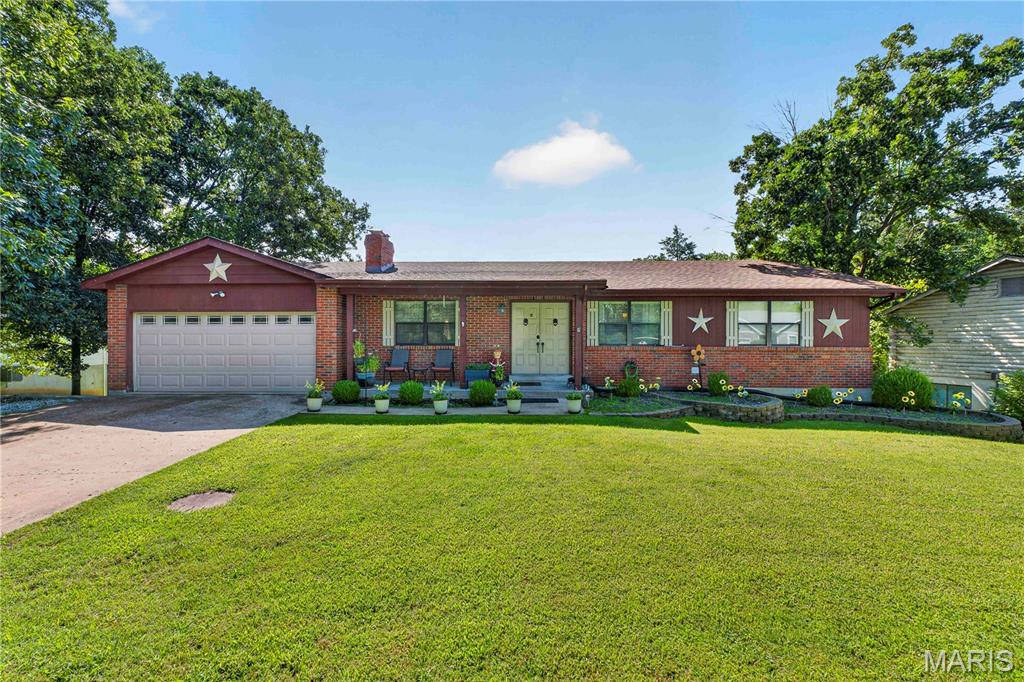 Welcome home to this beautiful, spacious ranch offering the perfect blend of comfort, functionality, and exceptional community amenities. With 3 bedrooms, 3 full bathrooms, and 2 versatile bonus rooms, this home provides plenty of space for everyday living, working from home, hobbies, or accommodating guests. The inviting open floor plan features a generous living area that flows seamlessly into the spacious kitchen, complete with ample cabinetry, abundant counter space, and a large walk-in pantry. Convenient main-floor laundry makes everyday living a breeze, while a second laundry area in the basement adds even more flexibility. The partially finished walkout basement is ideal for multi-generational living, entertaining, or extended guest accommodations. It includes a kitchen, bedroom, two bonus rooms, a full bathroom, and its own laundry room, offering endless possibilities. Step outside to your fully fenced backyard and enjoy peaceful mornings with a cup of coffee on the deck overlooking your private outdoor retreat. Located in the sought-after Raintree community, you'll enjoy an incredible lifestyle with access to four lakes for boating and fishing, pickleball courts, a private beach, camping grounds, a resident pavilion, and expansive common ground. The community also features a country club with a restaurant, swimming pool, and an 18-hole golf course, making every day feel like a vacation.