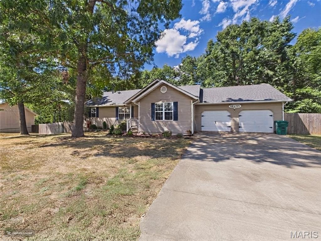 Welcome to 15455 Top Dr in Saint Robert! This spacious 3-bedroom, 3-bath home offers an inviting open floor plan, a brand-new roof, and over 3,000 square feet of living space. Located in the Thousand Hills subdivision, this home offers plenty of room to spread out with a setting that provides both privacy and convenience.

The main level features a great open floor plan that flows easily between the living spaces, making it ideal for everyday living and entertaining. The finished basement adds even more versatility with a large family room and full bathroom, creating the perfect space for guests, movie nights, hobbies, or a second living area.

Outside, the fenced backyard backs to a beautiful tree line, giving you a peaceful and private backdrop without looking directly into a neighbor's backyard. A wood deck, mature trees, established landscaping, and welcoming front porch add to the home's outdoor appeal.

Additional features include an attached two-car garage. With a new roof, spacious open layout, finished basement, fenced backyard, and wooded backdrop, this is one you'll want to keep on your radar!

More details and photos coming soon.