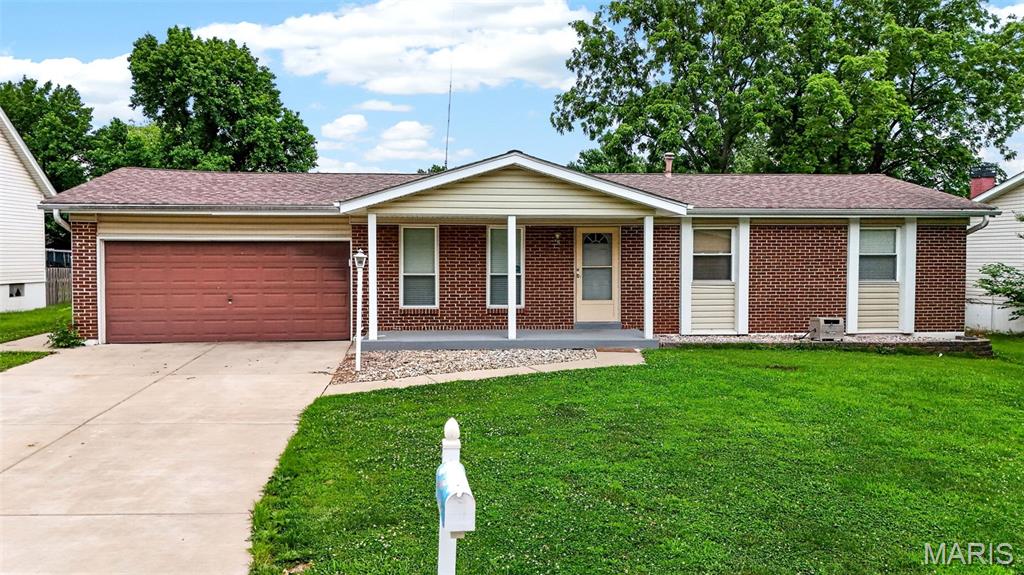 What a GREAT opportunity for the next buyer - great location, big updates done, now to make it your own! If you're good to paint and change out flooring in a couple rooms, you're going to have a great house with a beautifully updated kitchen, great yard, and tons of space! PLUS this home is in unincorporated St. Charles County so there's lower taxes - yay! Great curb appeal with brick and vinyl front home with an extra deep 2 car garage with newly installed heaters, and service door. You are welcomed into the spacious great room with laminate floor and large windows for natural light. The kitchen was beautifully updated in 2024 with new cabinets, quartz countertops, subway style backsplash and new appliances - including a gas stove! Upgraded wood look tile floor, pantry and plenty of room for your table! In the back on the home is a large family room with corner wood burning fireplace, decorative beams on the ceiling, and a sliding glass door that leads to your oversized covered patio and backyard! Your fenced backyard is great sized with electric ran and also as large shed for all your lawn storage needs, plus oversized gates on both sides of the yard for easier access! The primary bedroom has wood look tile floor, 2 closets, updated walk in shower, and adult height vanity! Two additional bedrooms and full bath complete the main level. Downstairs is a mostly finished basement - giving you so much more space for your family! The main area has finished drywall and all you need is flooring and to wall off the laundry/storage area! The rec room is large with decorative bead board and chair rail so much space for a kids play room, sleeping room, or office - possibilities are endless! Roof and AC are only 6 years old, all appliances and washer/gas dryer to stay. Seller prefers to sell as is.