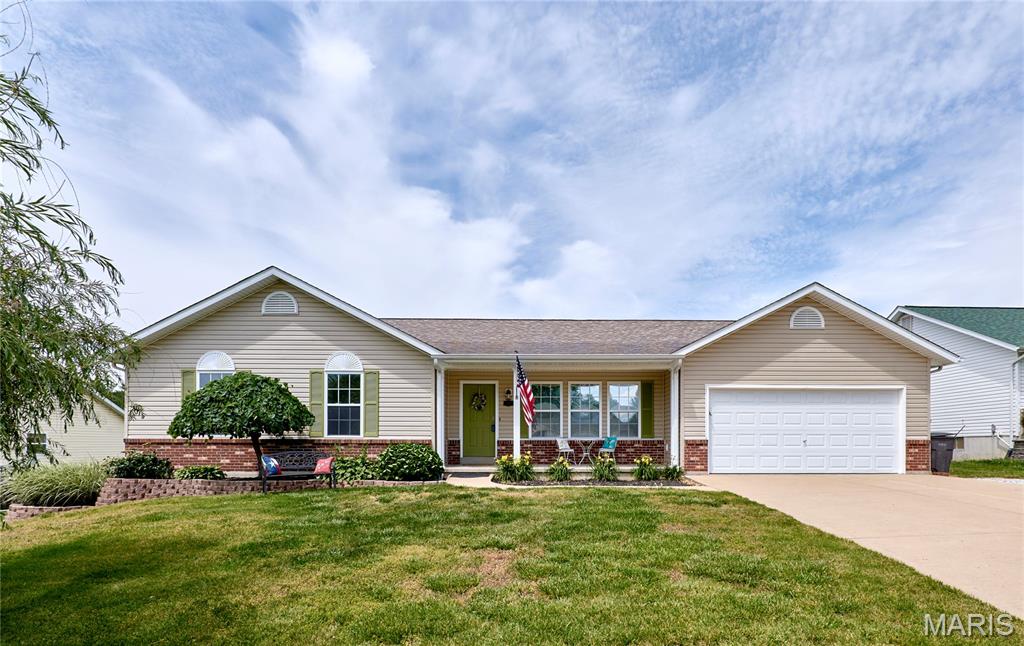 Welcome home to this beautifully maintained ranch in a highly desirable location within the Troy School District! Offering 3 bedrooms and 2 full baths on the main level, this home features an open floor plan with vaulted ceilings that create a bright and spacious feel throughout. The inviting sunroom leads to a back deck complete with a pergola, plus a lower deck with easy access to the fire pit area—perfect for relaxing or entertaining. Main floor laundry adds convenience, while the large covered front porch and landscaped lot provide wonderful curb appeal.

The partially finished lower level offers additional living space including a large family room, rec room area, full bathroom, an additional room with closet that could serve as a sleeping room, plus another versatile room ideal for a home office or exercise space. French doors lead directly to the backyard patio for added functionality. The 2-car attached garage includes an additional 10x7 storage/workshop area, and the graveled side drive provides extra parking for guests, trailers, or recreational vehicles. This home truly offers space, flexibility, and comfort both inside and out!