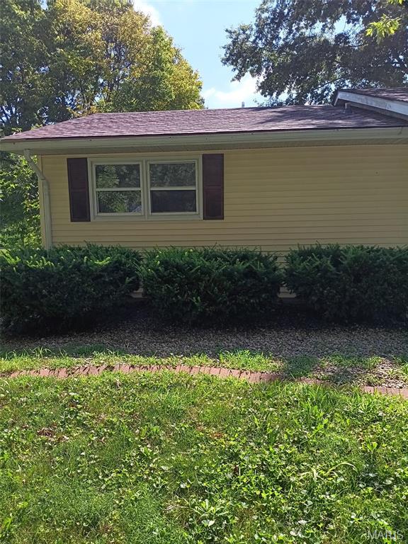NEW ROOF PICTURES UPLOADED 7/23/2026.
Welcome to 923 Sumner St., a comfortable 3-bedroom, 2-bath ranch set on a spacious 0.52-acre lot in Jerseyville IL. Inside, the 936-square-foot layout has warm, easy-to-manage living spaces, a functional kitchen with rich wood cabinetry and stainless appliances, and a bright dining area with convenient access to the backyard. The home also includes a dedicated utility room, an attached 1-car garage, ceiling fans, and a mix of carpet and hard-surface flooring. Step outside to enjoy the rear patio and deck, mature shade trees, and plenty of yard space for relaxing, gardening, entertaining, or creating the outdoor setup you have been planning. Built in 1981, this inviting home has practical single-level living with room to make it your own. A new roof was installed July of 2026.  Stop by and see the possibilities this Jerseyville property has!  The space and flexibility both inside and out is impressive. The oversized half-acre lot is a rare.