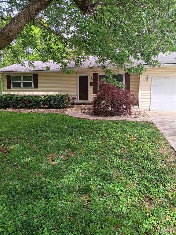 Welcome to 923 Sumner St., a comfortable 3-bedroom, 2-bath ranch set on a spacious 0.52-acre lot in Jerseyville IL. Inside, the 936-square-foot layout has warm, easy-to-manage living spaces, a functional kitchen with rich wood cabinetry and stainless appliances, and a bright dining area with convenient access to the backyard. The home also includes a dedicated utility room, an attached 1-car garage, ceiling fans, and a mix of carpet and hard-surface flooring. Step outside to enjoy the rear patio and deck, mature shade trees, and plenty of yard space for relaxing, gardening, entertaining, or creating the outdoor setup you have been planning. Built in 1981, this inviting home comes has practical single-level living with room to make it your own. A new roof was installed July of 2026.  Stop by and see the possibilities this Jerseyville property has!

The space and flexibility both inside and out is impressive. The oversized half-acre lot is a rare find and provides plenty of room for entertaining, play, gardening, family cookouts, a firepit, or simply relaxing beneath the mature shade trees. The rear patio and deck make it easy to enjoy quiet mornings or spend time outdoors with family and friends.  It feels peaceful and private without being far from the places you need to go.

It feels peaceful and private without being far without being far from the places you need to go!  Homes like this do not wait around!