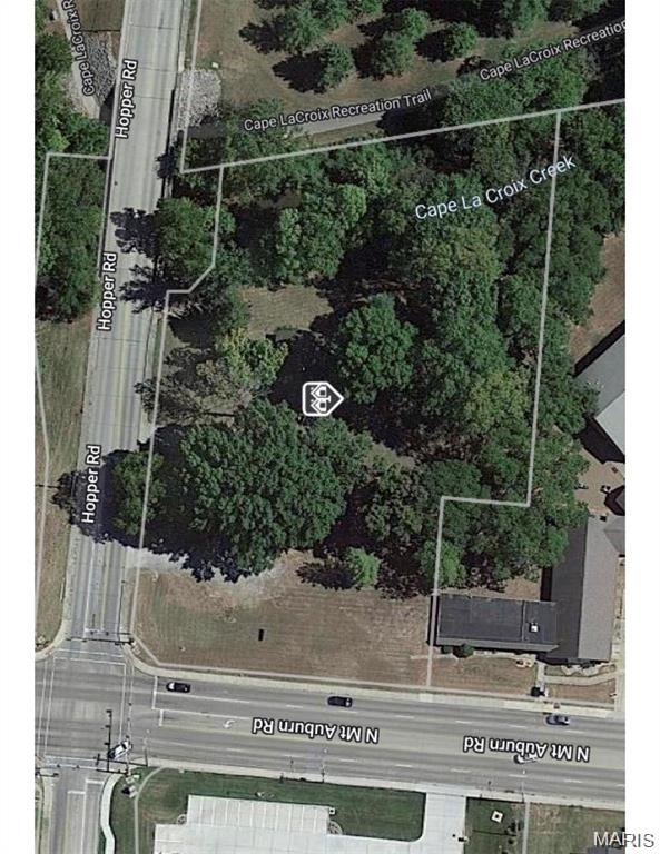 THIS IS A PRIME COMMERCIAL PARCEL that will make a perfect location for a custom professional office redevelopment or a small strip. This is a high traffic location with access to all the city utilities. A total of 2.14 acres zoned commercial. Call for more information! Location: City, Corner Location, High Traffic