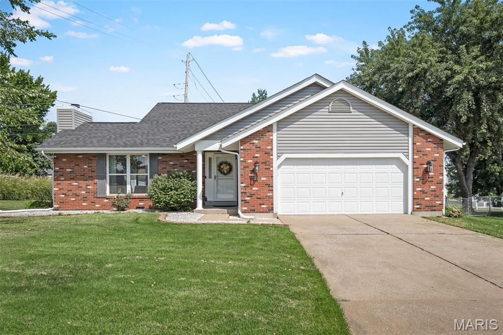 PRICE REDUCED!  It's beautiful inside and out. Almost everything has been updated on this house in the last few years. The gorgeous cathedral ceiling in the great room makes this home inviting and open. The newly remodeled kitchen opens to the dining room with tons of natural light. The master bedroom offers an on suite bathroom with new floors and Onyx shower. The finished space in the basement offers so many options. All new floors throughout the home make the space flow effortlessly. Oversized two car garage, fenced back yard and a great location! What more could you ask for? Come check it out for yourself.