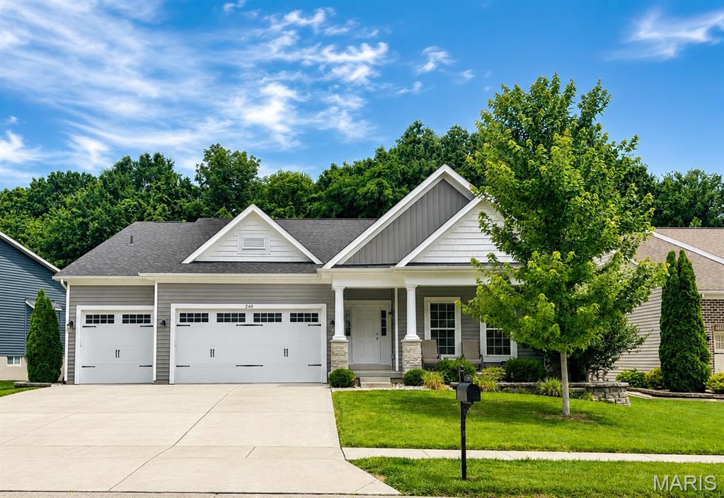 Welcome to 240 Carlton Point in Wentzville! This beautifully maintained ranch home offers 2,228 square feet of comfortable living space with a sought-after split-bedroom floor plan designed for both privacy and functionality. The spacious primary suite is tucked away from the secondary bedrooms and features a private bath with 2 vanities and a generous walk in closet.

The open and inviting layout includes 3 bedrooms, 2 full bathrooms, and a large open concept ideal for everyday living and entertaining. The kitchen features a center island with seating for 4, stainless steel appliances and a large pantry cabinet. The breakfast room flows off the kitchen and seamlessly out to the covered back patio, where you can relax and enjoy peaceful views of trees and feed deer, turkey, squirrels and birds. A charming covered front porch adds to the home's curb appeal and provides another inviting outdoor space.

Need room to grow? The full unfinished basement offers endless possibilities and is already equipped with an egress window and rough-in bath, making it ready for future expansion, additional living space, or extra bedrooms.

Additional highlights include a spacious 3-car garage, ample storage, and a quiet setting backing to trees while still being conveniently located near shopping, dining, parks, and major highways.

Enjoy the subdivision pool, park and walking paths.

Don't miss this opportunity to own this 7 year young home with upgrades galore and room to grow.