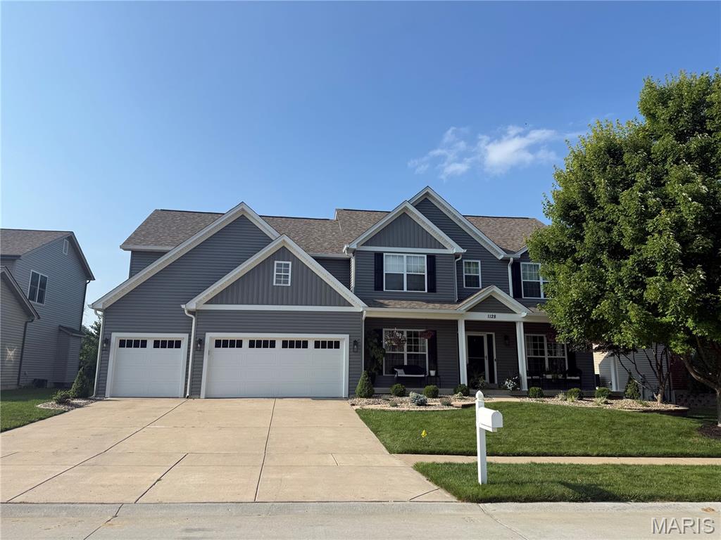 Beautiful 3,550 sq. ft. two-story home in the Manors at Deer Creek featuring 4 bedrooms, 3.5 baths, a 3-car garage, and a rare premium lot with a large, flat backyard backing to water, mature trees, and common ground. The main level offers an updated kitchen with quartz countertops, hardwood flooring, generous living areas, and views overlooking the backyard and water. The second floor includes a large primary suite, Jack-and-Jill bath, additional bedrooms, and an open loft space. The full unfinished basement features a 9 ft. pour, ample storage, and future expansion potential.

Major exterior updates include a new roof (2024), new siding (2025), new gutters (2025), and new garage doors (2025). Interior updates include kitchen cabinets and quartz countertops (2025), carpet (2022), and refreshed landscaping (2025). Additional features include an irrigation system and hot tub. Located in the Fort Zumwalt North School District with convenient access to nearby amenities.