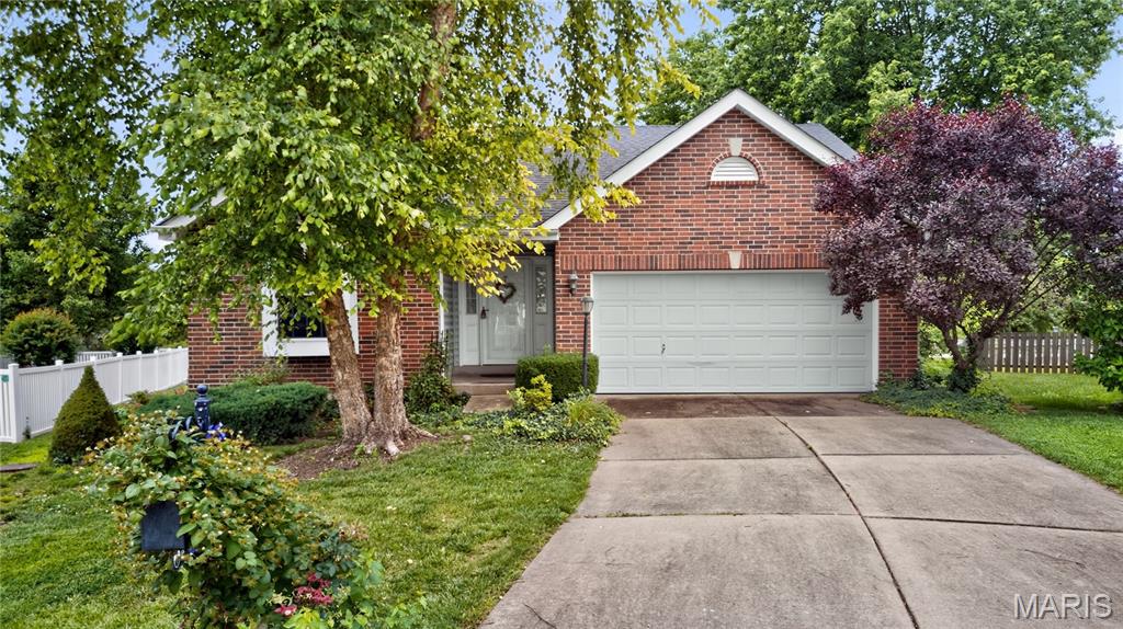 Welcome home to this charming ranch-style residence in the heart of O'Fallon! Built in 2002, this well-maintained 2-bedroom, 2-bath home offers 1,132 square feet of comfortable single-level living. The inviting living room features a cozy fireplace, creating the perfect space to relax and entertain. The functional floor plan includes spacious bedrooms, two full bathrooms, and a bright, open living area. A par basement provides additional storage or future finishing potential. Situated on a level lot, the property also features a 2-car garage and low-maintenance brick veneer exterior. Enjoy community amenities including a neighborhood pool, with HOA services covering common area maintenance and snow removal. Conveniently located in the desirable Wentzville School District near shopping, dining, parks, and major highways, this home offers both comfort and convenience. Don't miss this opportunity to own a move-in-ready home in a sought-after O'Fallon location!