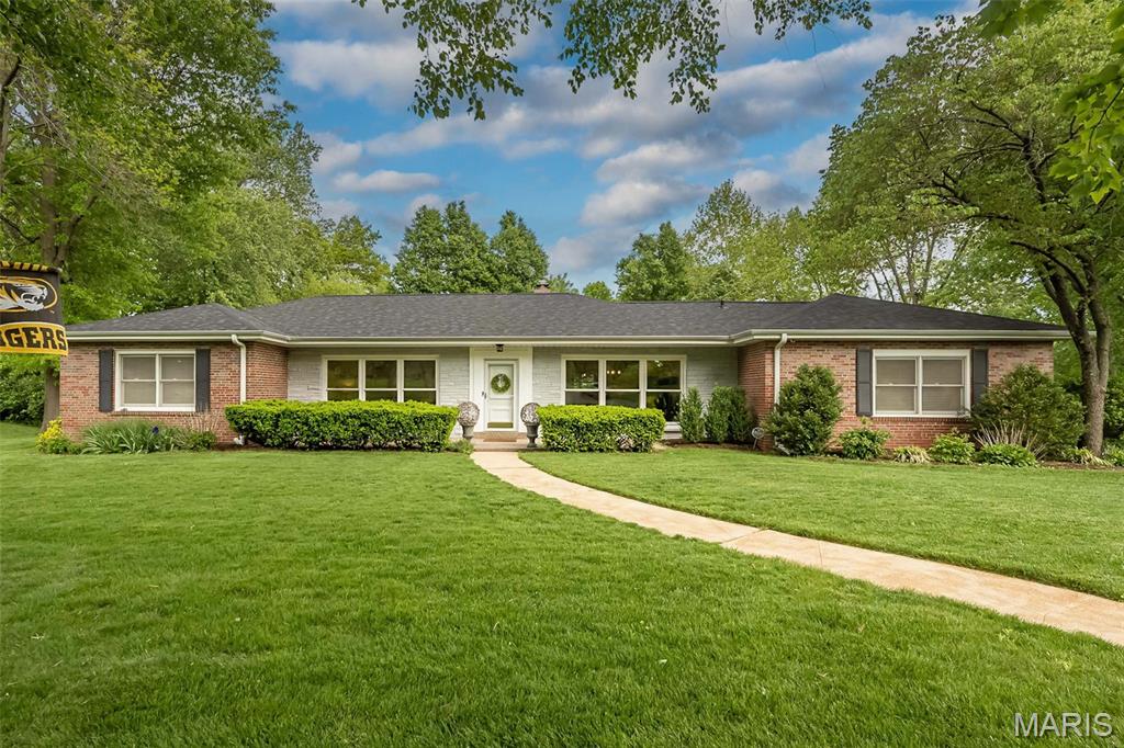 Tucked away on a private cul-de-sac on a coveted Ladue Lane, this beautifully reimagined residence offers the ease of refined, all one level living paired with an exceptional outdoor retreat.  Designed with todays discerning Ladue buyer in mind, the home showcases an open, sophisticated floor plan enhanced by oversized new windows that flood the interiors with natural light. Walking in you are greeted with a sundrenched living room with large windows and beautiful wood floors. The gourmet kitchen serves as the heart of the home, seamlessly flowing into a spacious sundrenched dining room.  Kitchen also adjoins the enchanting family room highlighted by dramatic double width glass sliding doors that open effortlessly to the outdoor oasis. Main level features a serene primary suite, a second bedroom with its own ensuite bath, and a third bedroom with hall bath, ideal for family or guests.  The thoughtfully finished lower level expands the living space with two additional bedrooms with egress windows, a spacious updated shared bath, generous recreation area and dedicated laundry space. Step outside to experience a true backyard sanctuary.  The outdoor oasis is designed for both relaxation and entertaining.  Complete with a stunning pool, fire pit, sophisticated hardscaping and an expansive deck that invites gatherings of all sizes. A three car garage provides ample storage and convenience, while the homes prime location offers the ability to walk to nearby schools.  Recent updates include HVAC, Roof, hot water heater, expanded driveway and so much more. An exceptional opportunity to enjoy elegant living in one of Ladue's most desirable settings.