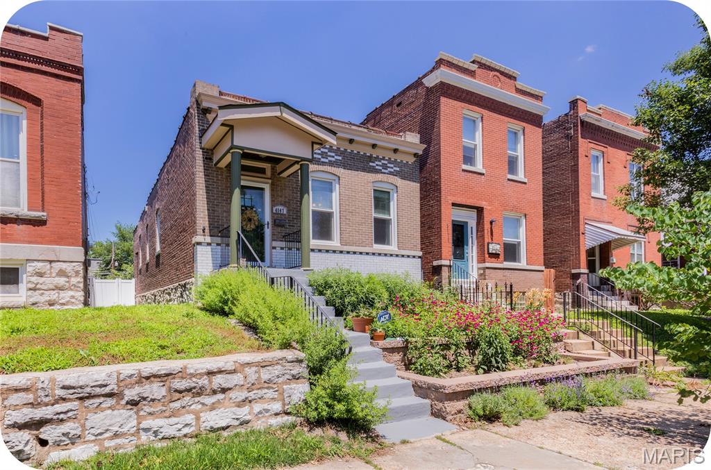 Some houses are updated, this one is curated. Dripping with personality and design confidence, this Tower Grove South charmer proves that "cool" and "comfortable" can absolutely coexist. Inside, creative color choices bring warmth and character to every room, while engineered hardwood floors, an updated kitchen, and an updated bath provide the practical upgrades buyers love. The living and dining rooms flow effortlessly together, creating a space that feels both stylish and inviting. One generously sized bedroom and a second smaller bedroom offer flexibility for a little one, a home office, or creative pursuits. Outside, the thoughtfully designed front and back gardens showcase native perennials that provide beauty, habitat, and seasonal interest year after year. A 2-car concrete parking pad rounds out the package. Just blocks from Tower Grove Park, MOBOT, and the restaurants, pubs, and neighborhood favorites along Morganford and South Grand—this is serious city living goals.