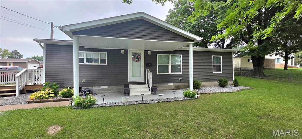 Here's an adorable 3-bed, 2-bath manufactured home sitting on a corner lot in tranquil Steeleville with lots of parking space. A lot of updating has been done by the owner during the 7 years they've owned it. Hot water heater was installed by PSI in 2025, new flooring in many rooms and updated bathroom. The kitchen is eat-in and very roomy. The primary bedroom has a large walk-in closet. New sliding door from the kitchen onto the wrap-around deck installed in 2021 leads you to the large backyard. Priced to move fast. Seller is selling as-is and would rather offer seller credit for repairs than do them.  Make an appointment to see this one soon! We think it's gonna go fast!