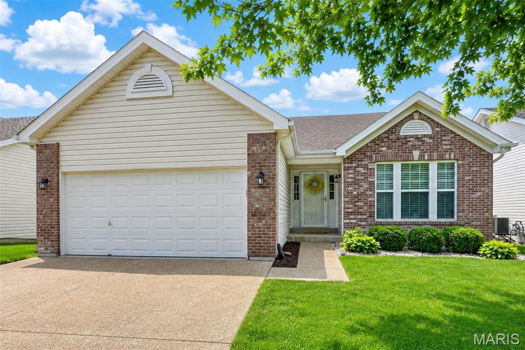 This adorable free-standing villa in desirable Ellington Place is ready for a new lucky owner! Not your ordinary villa. The sellers have added so many updates. Pride of ownership abounds!!!A welcoming entry foyer with open floor plan with soaring vaulted ceilings. The wood floors throughout the main floor are a HUGE, beautiful upgrade. Custom 42 inch-stained white kitchen cabinets with added pull-out shelving, stainless appliances, built in double oven, gas cooktop, pantry and breakfast bar to seat 4 are sure to please any chef. The cozy vaulted great room has a wood burning fireplace and plenty of space for your entertaining. The breakfast room leads out to a larger composite covered deck to enjoy your morning coffee or an evening glass of wine! Large master bedroom master bath with soaking tub and separate shower! Second bedroom and full bath, Main floor laundry room and 2 car garage Washer dryer and refrigerator remain carefree living in desirable Ellington Place. Located close to YMCA, shopping, dining and HWY access.