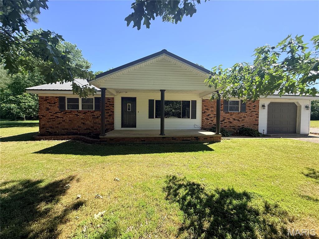 Completely remodeled and move-in ready! This beautiful 3-bedroom, 3-bath home at 144 Harrison Lane in Poplar Bluff offers the perfect combination of modern updates, space, and functionality. The living room features a cozy fireplace with custom built-in shelving, creating a warm and stylish focal point for the home.
Situated on a spacious .8533-acre lot, the property includes an attached one-car garage plus a detached shop with RV storage and lean-to — ideal for hobbies, extra storage, or outdoor equipment. With updated finishes throughout and plenty of indoor and outdoor space, this property is perfect for anyone looking for comfort, convenience, and room to grow. All new plumbing throughout! HVAC is around 3 years old, Windows are around 4 years old and the Roof is around 5 years old! Don’t miss your chance to own this beautifully updated property in Lake Road School District!