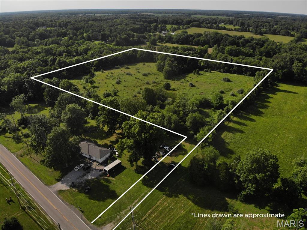 10 Acres of Secluded Country Living with Pond, Timber & Utilities

Discover the perfect blend of privacy and convenience with this beautiful 10-acre property offering access from E. Fairfield Rd. While easily accessible, the acreage is tucked back from the road, creating a peaceful and secluded setting ideal for your dream home, recreational retreat, or weekend getaway.

The property features a small pond nestled near the center of the acreage, adding both scenic beauty and a valuable water source for local wildlife. A mix of open ground and mature timber provides character, privacy, and excellent habitat for deer, turkey, and other wildlife, making this a great opportunity for nature lovers and outdoor enthusiasts.

A water meter is already in place, and additional utilities are available to be tapped into along the road, offering a head start for future development. Whether you're looking to build, hunt, explore, or simply enjoy the tranquility of rural living, this property offers endless possibilities.

Property Highlights:

10 secluded acres with access off E. Fairfield Rd.
Water meter already installed
Additional utilities available at the road
Small pond located near the center of the property
Mature timber and natural wildlife habitat
Excellent deer and turkey activity
Ideal homesite, recreational tract, or weekend retreat
Convenient access while maintaining privacy

This rare combination of seclusion, natural beauty, and utility availability makes this property one you won't want to miss.