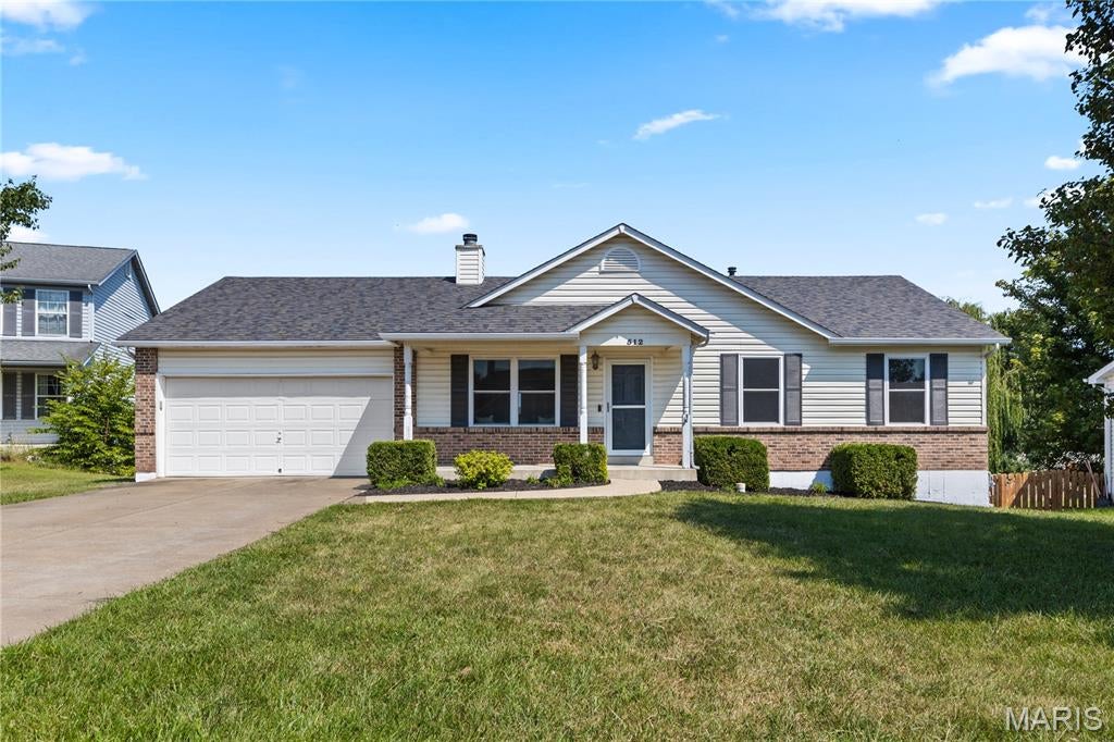 GREAT HOUSE!!! Welcome to 512 Spring Water Dr, tucked into Wentzville's Whisper Creek neighborhood! Step inside and you're greeted by SOARING VAULTED CEILINGS in both the living room and kitchen, giving the main level a bright, open feel. Three bedrooms are conveniently located on the main floor, along with a full hall bath and your own private primary bath. Head downstairs to the FINISHED BASEMENT with BRAND NEW CARPET, giving you extra living space for a family room, playroom, or home office. The basement also includes an additional bedroom and FULL BATHROOM! The entire home was just freshly painted top to bottom, and you'll find newer stainless steel appliances waiting in the kitchen, ready to go from day one. Out back, step through the HUGE DECK to a HUGE FENCED, FLAT BACKYARD — plenty of room to entertain, garden, or let everyone spread out. Add in an attached 2-car garage and a spot in the Wentzville School District, zoned for top-rated Timberland High School, and this one checks every box. Plus, the BRAND NEW ROOF adds peace of mind for years to come. THIS WON'T LAST LONG!!! SCHEDULE YOUR SHOWINGS TODAY!!!